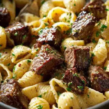 Steak Bites and Shell Pasta in Garlic Butter Alfredo Sauce